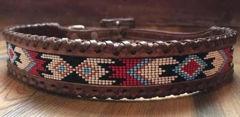 Genuine leather dog collar with red, white, and black southwest beaded inlay design, a leather wrapped edge