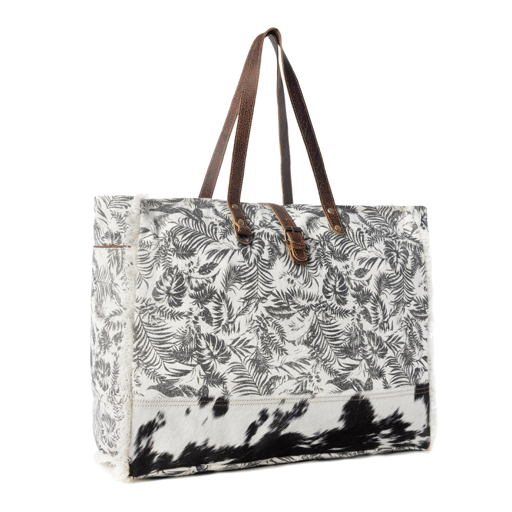 Myra Wildfern Hide Western Weekender Bag for Women in ivory with hairon detail